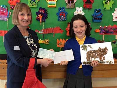 Y4 pupil Frances from Corbridge CE First School and Brenda Fleming, Supply Chain Supervisor at JDP