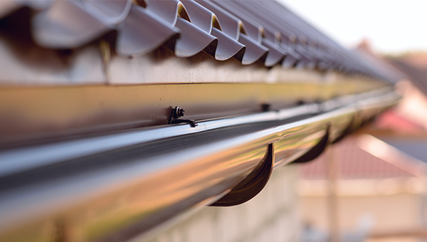 A piece of black guttering.