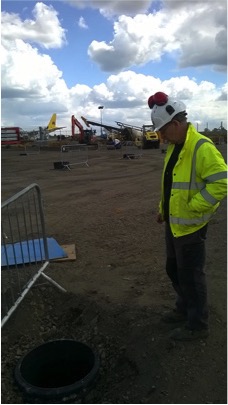 Contractor inspecting Axedo chamber shaft