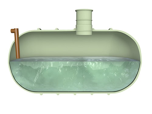 A cross section of a cesspool with effluent inside.