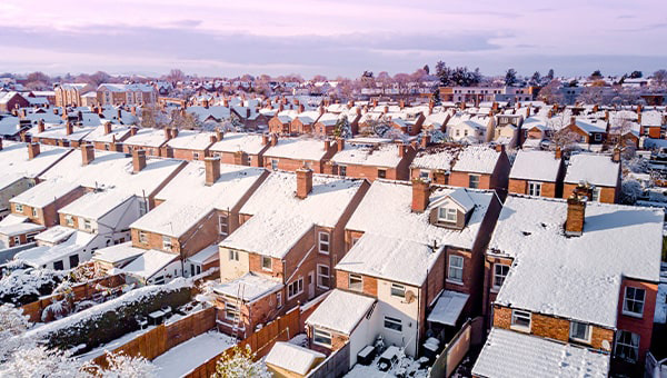 Rows of snow covered houses.