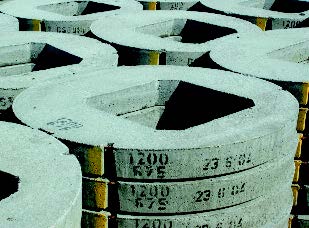 Concrete manhole rings.