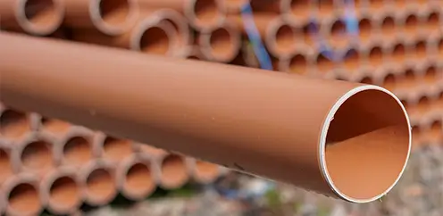 Bundle of DYKA UNDERGROUND drainage pipes.
