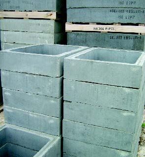 Rectangular concrete chamber sections.