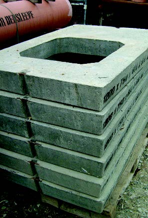 Rectangular concrete cover slabs.