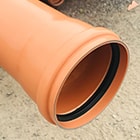 Orange underground drainage pipe.